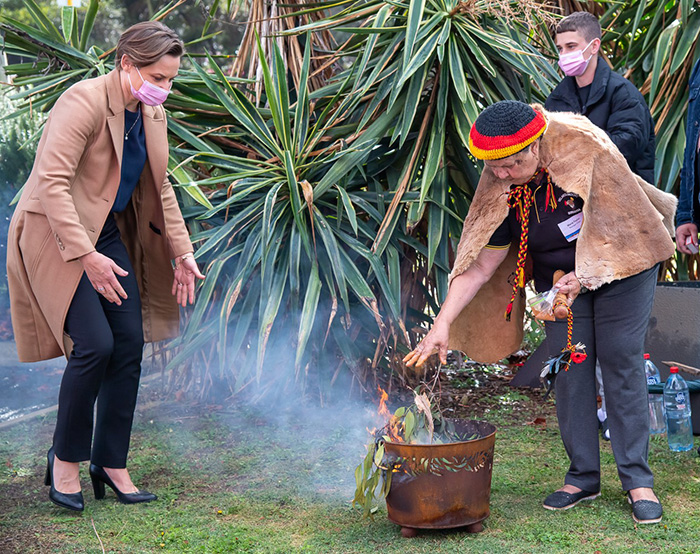 Minister and Auntie Marie smoking ceremony