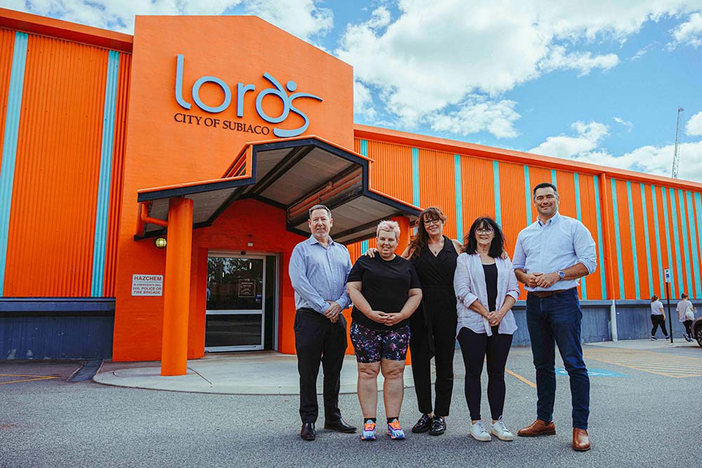 Five people standing outside Lords Recreation Centre